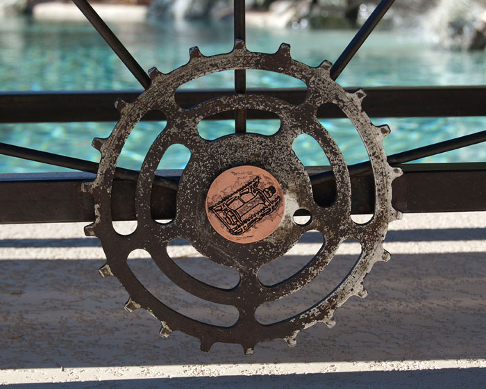 Vintage chain wheel with etched copper medallion