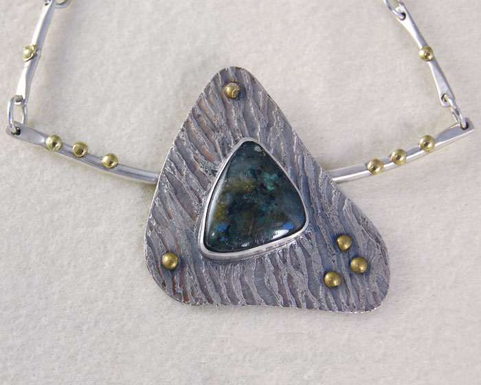 Labradorite, etched silver with patina, brass accents