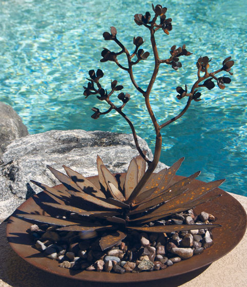 Potted Agave Rusted steel and river stone