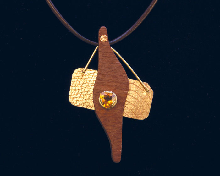 Citrine, textured brass, and wood